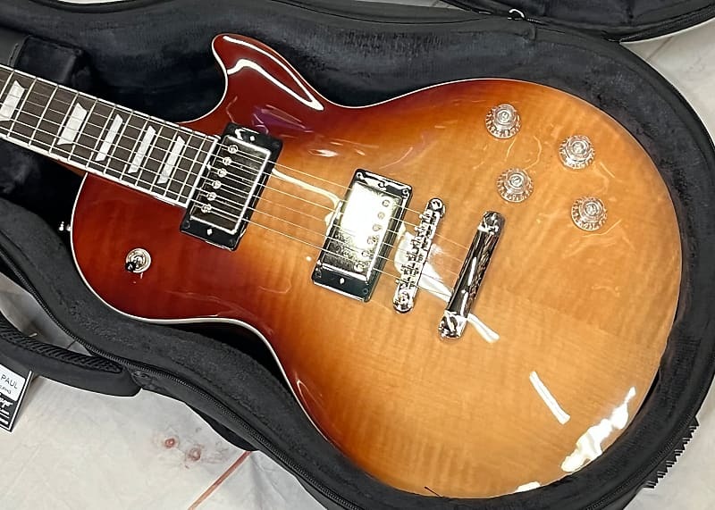 Epiphone Les Paul Modern Figured Caffe Latte Fade New Unplayed с футляром Epi Lite Auth Dealer 7lb 14oz
Epiphone Les Paul Modern Figured Caffe Latte Fade New Unplayed с футляром Epi Lite Auth Dealer 7lb 14oz