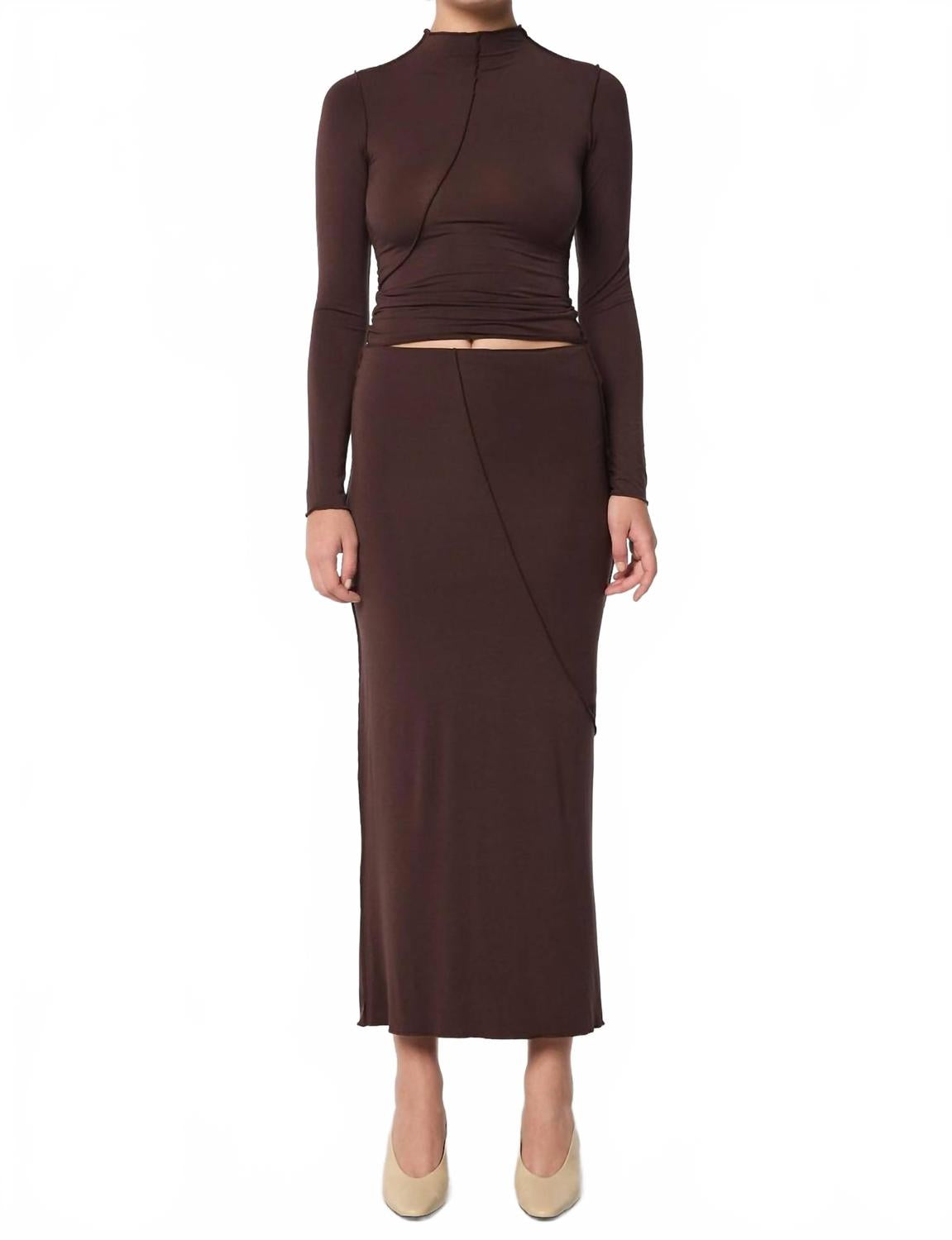 Юбка миди Vana в шоколадном цвете THE LINE BY K
Юбка миди Vana в шоколадном цвете THE LINE BY K