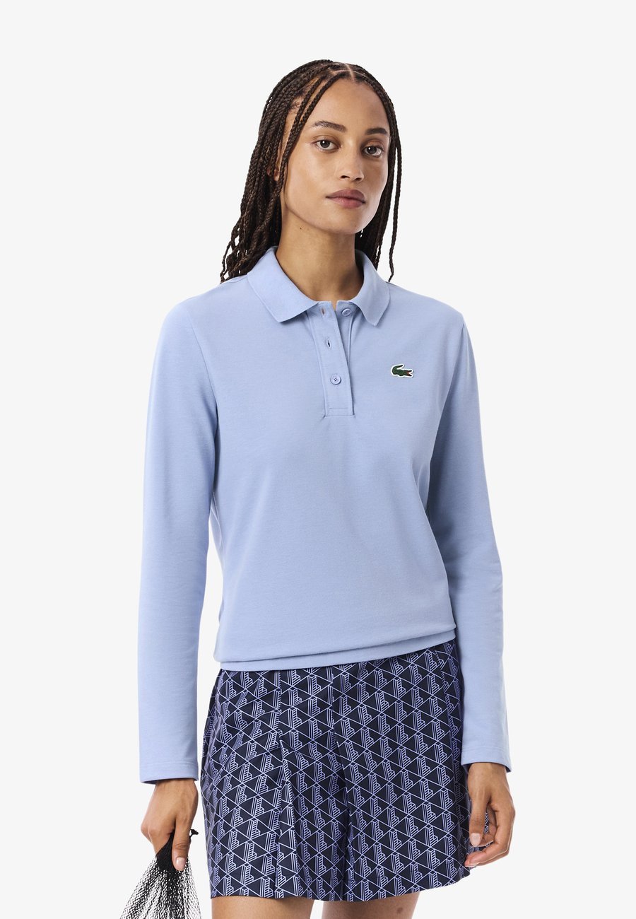 Поло Lacoste ML FEMME-PF, Violet-Qd/Purple
Поло Lacoste ML FEMME-PF, Violet-Qd/Purple