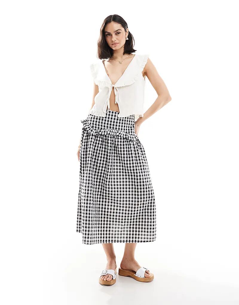 Юбка миди в клетку виши с оборками от Wednesday's Girl, чёрного цвета 
Юбка миди в клетку виши с оборками от Wednesday's Girl, чёрного цвета