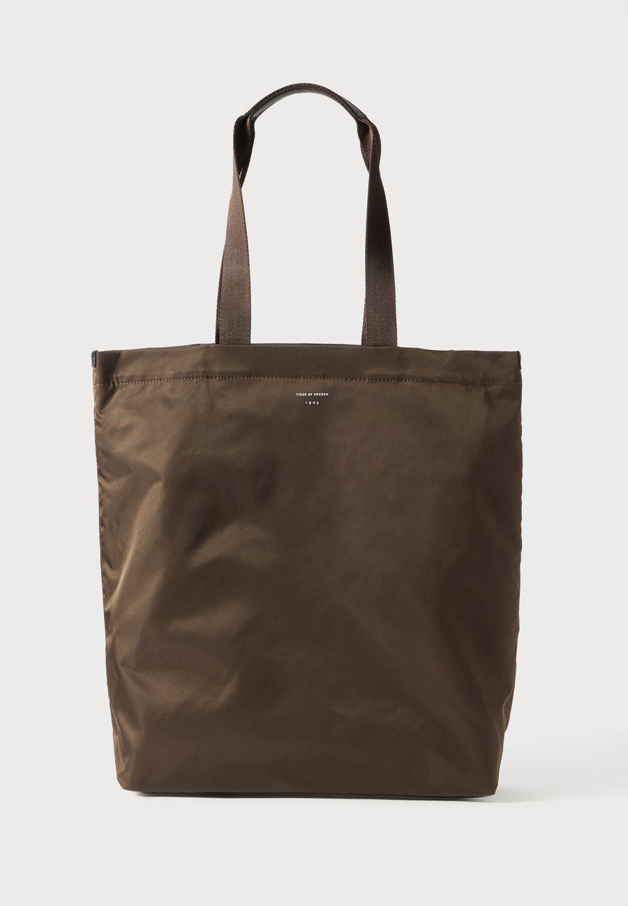 Сумка-шоппер Tiger of Sweden CUCU UNISEX, Dark Brown
Сумка-шоппер Tiger of Sweden CUCU UNISEX, Dark Brown