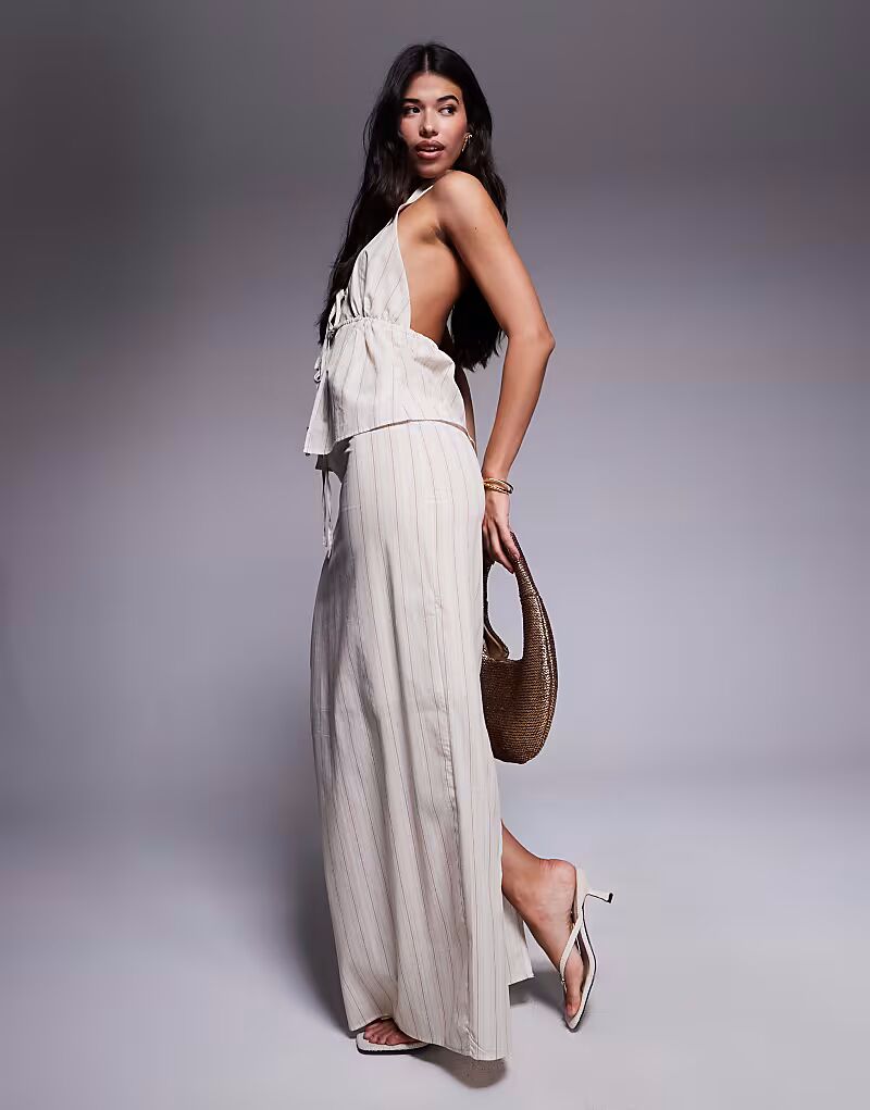 Эксклюзивная хлопковая юбка Kaiia с завязкой на талии и льняным эффектом в тон в кремовую полоску
Эксклюзивная хлопковая юбка Kaiia с завязкой на талии и льняным эффектом в тон в кремовую полоску