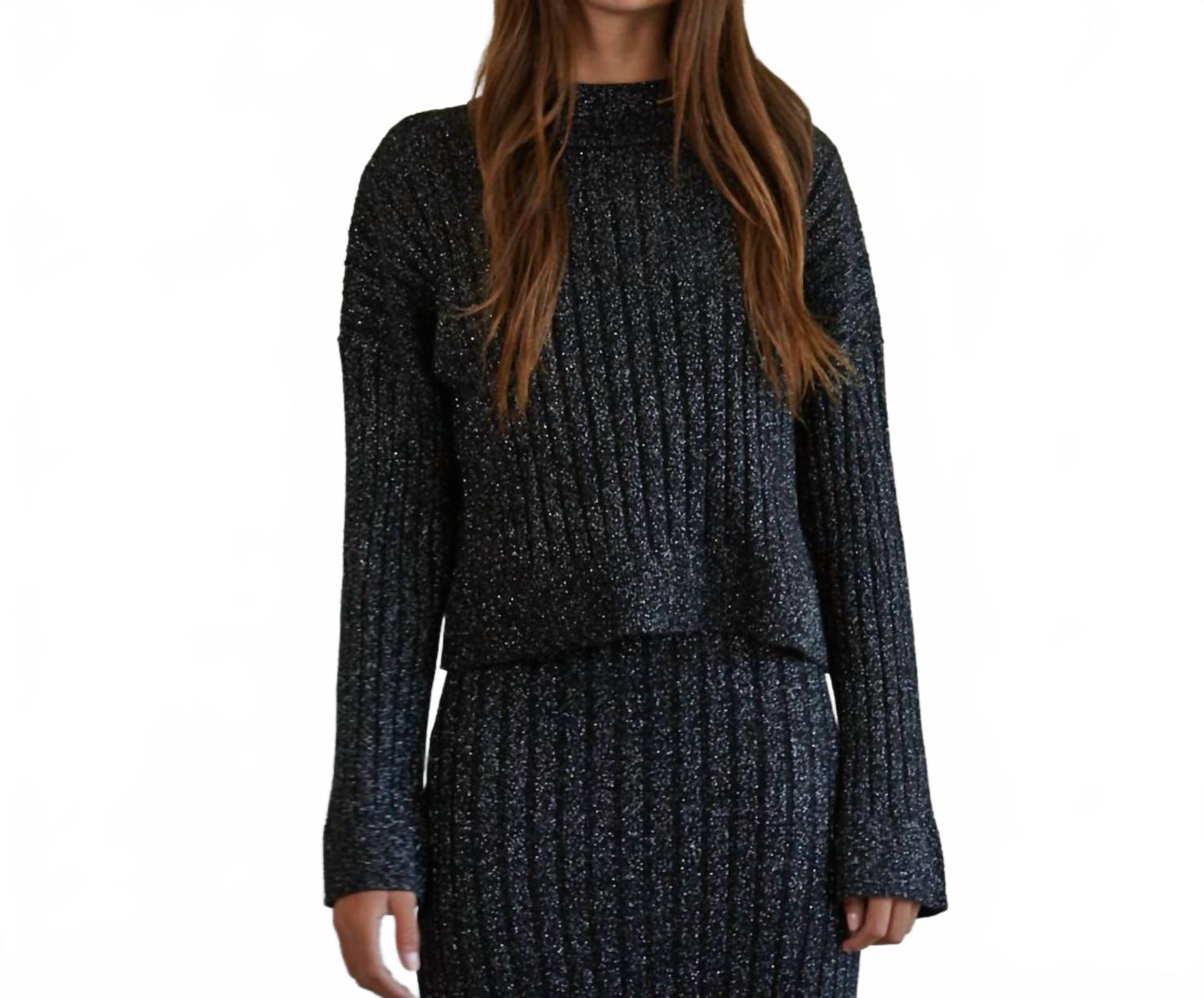 Черный свитер с ночным мерцанием By Together
Черный свитер с ночным мерцанием By Together