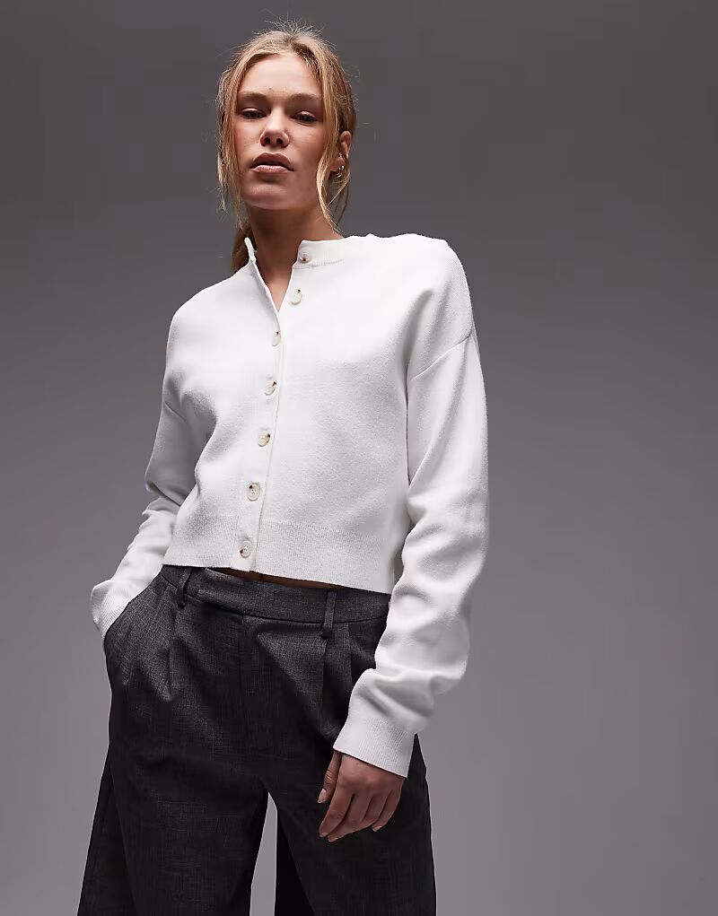 Компактный вязаный кардиган цвета слоновой кости Topshop
Компактный вязаный кардиган цвета слоновой кости Topshop