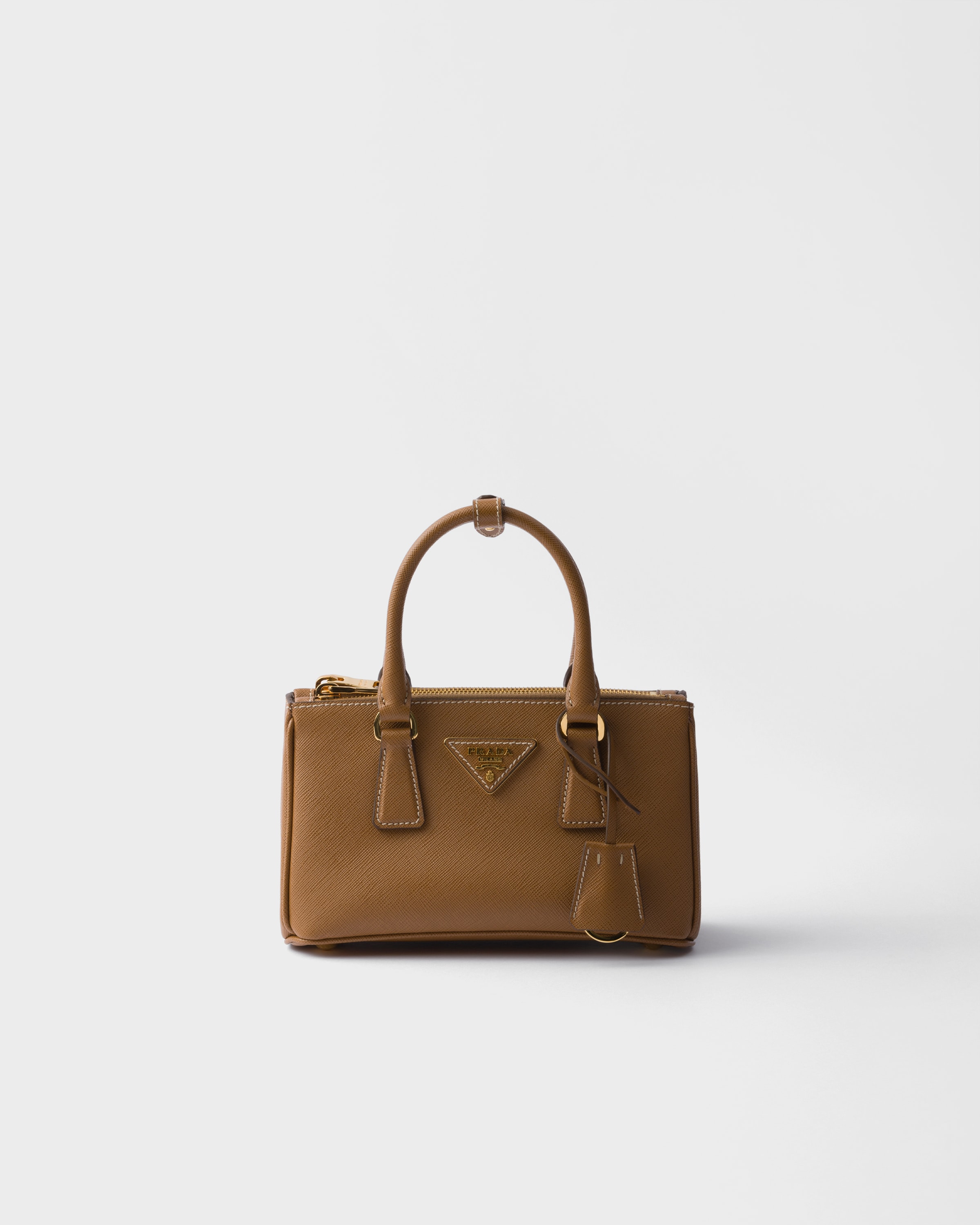 Мини-сумка Prada Galleria из сафьяновой кожи, коричневый
Мини-сумка Prada Galleria из сафьяновой кожи, коричневый