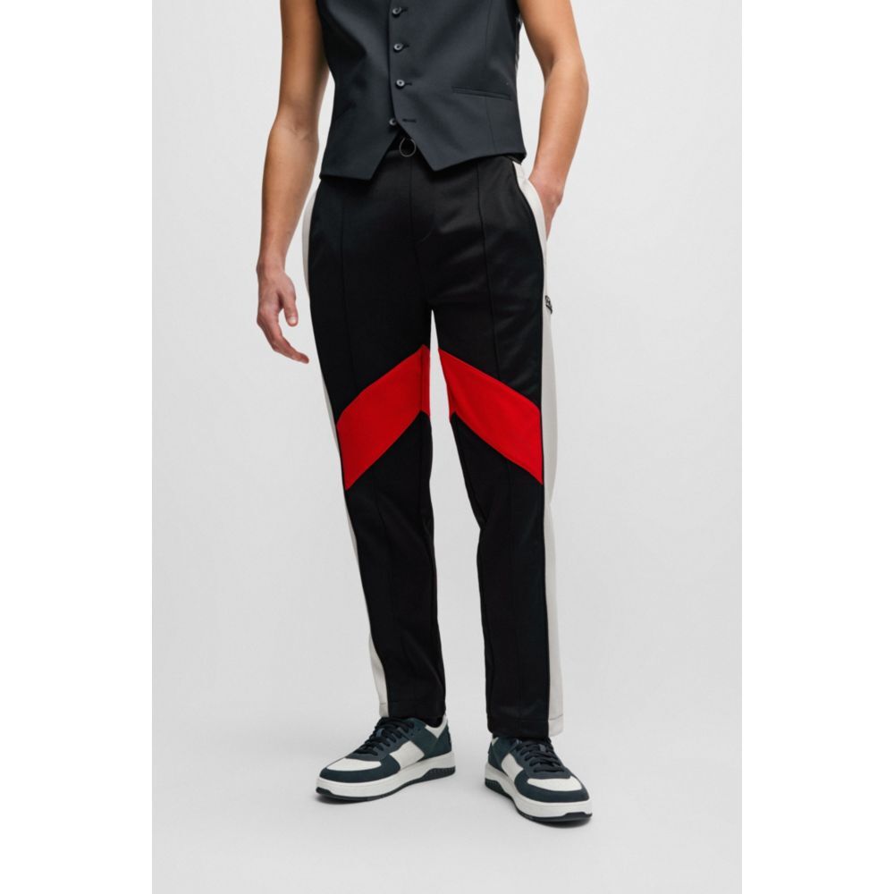 Спортивные брюки свободного кроя с цветными блоками Hugo, черный
Спортивные брюки свободного кроя с цветными блоками Hugo, черный
