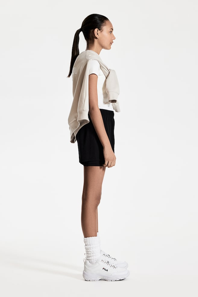 Двухслойные шорты для бега из материала DryMove H&M, черный
Двухслойные шорты для бега из материала DryMove H&M, черный