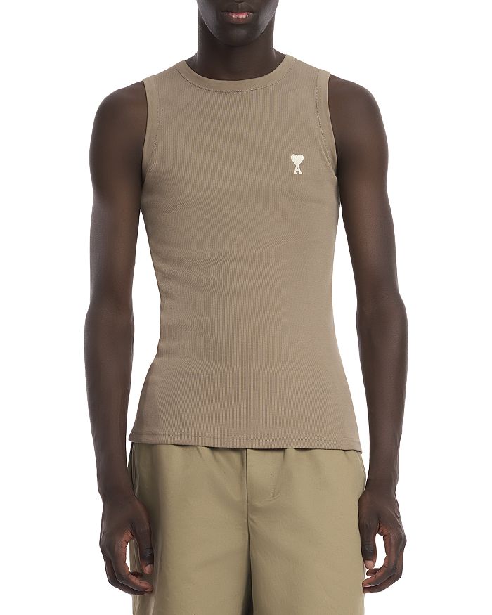 Классический приталенный топ с логотипом и резинкой AMI, коричневый/бежевый
Классический приталенный топ с логотипом и резинкой AMI, коричневый/бежевый