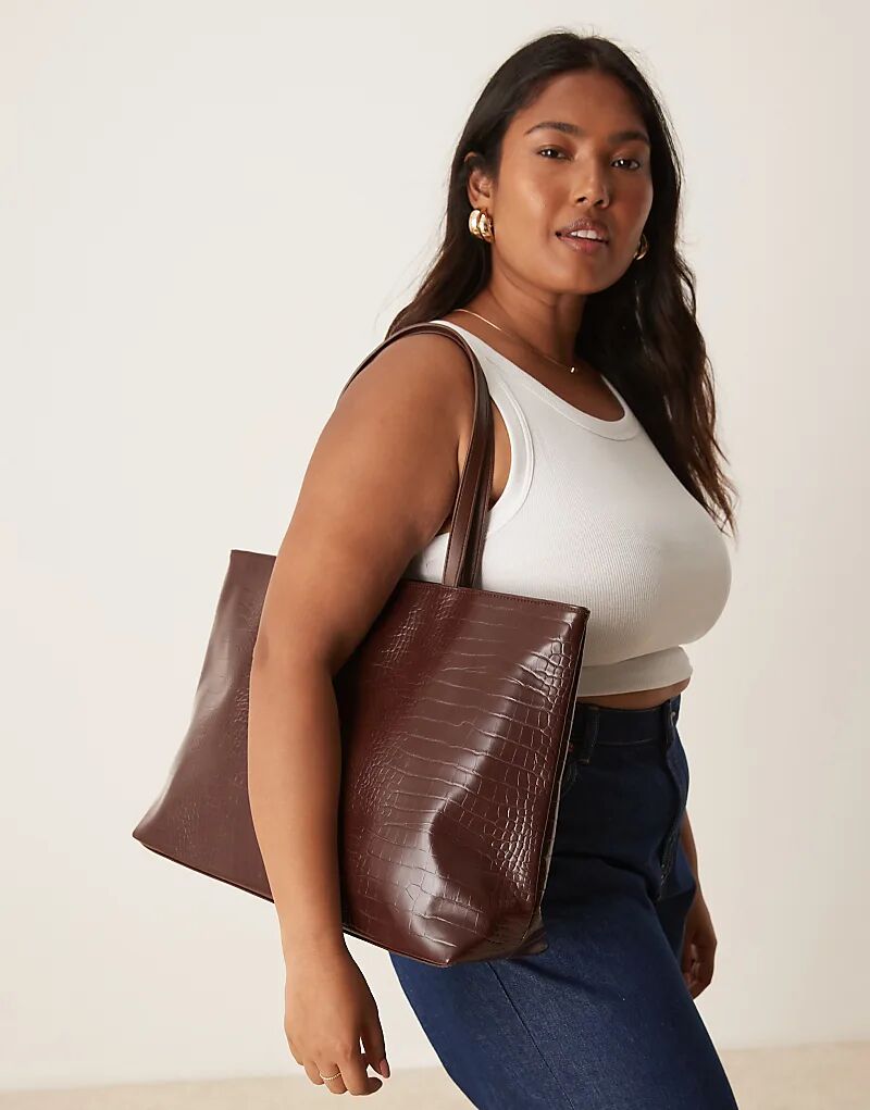 Гламурная большая сумка-тоут с фактурой крокодиловой кожи коричневого цвета
Гламурная большая сумка-тоут с фактурой крокодиловой кожи коричневого цвета