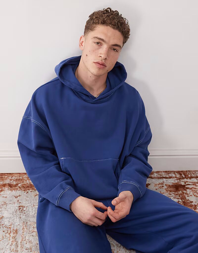 COLLUSION Свободная укороченная толстовка с капюшоном темно-синего цвета со швами и принтом
COLLUSION Свободная укороченная толстовка с капюшоном темно-синего цвета со швами и принтом