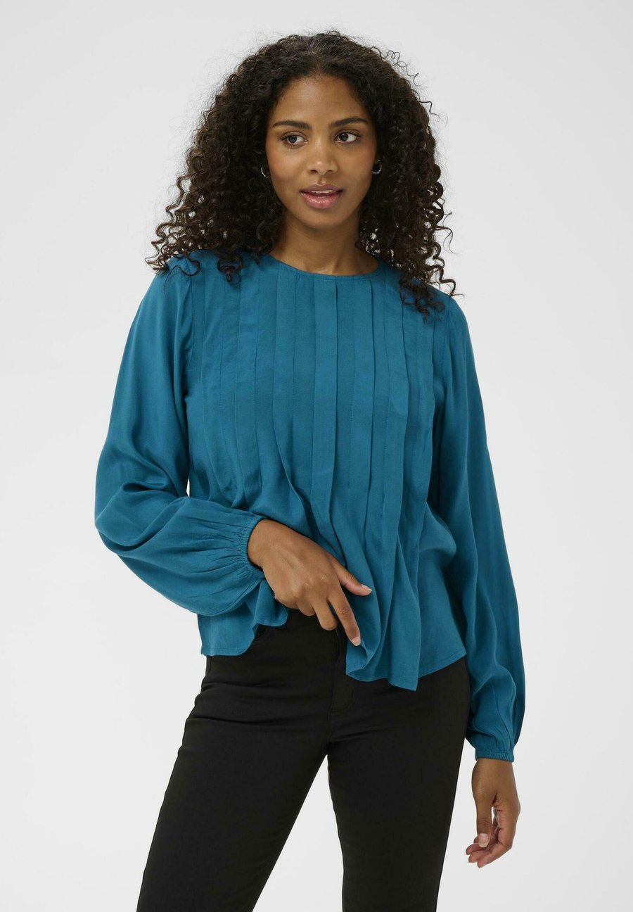 Блуза Kaffe KAARIA BLOUSE, Lyons Blue/Teal
Блуза Kaffe KAARIA BLOUSE, Lyons Blue/Teal