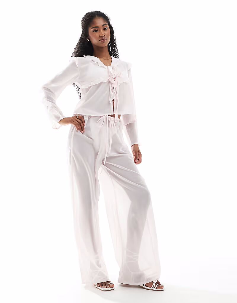 Прозрачные пляжные брюки Esmee Exclusive розового цвета Esmée
Прозрачные пляжные брюки Esmee Exclusive розового цвета Esmée