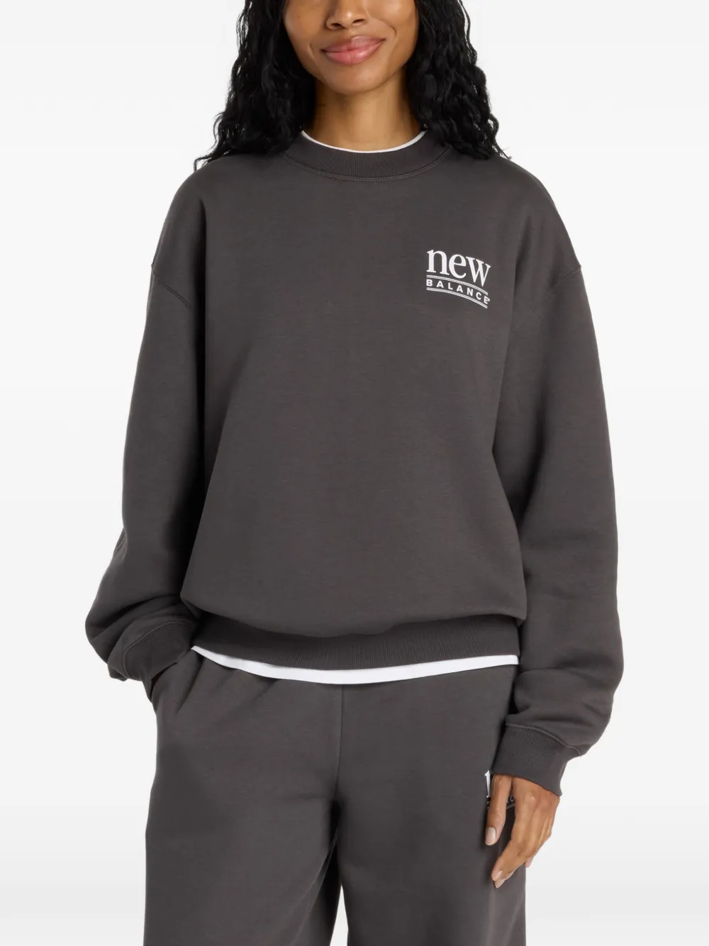 Свитшот с логотипом и круглым вырезом New Balance, черный
Свитшот с логотипом и круглым вырезом New Balance, черный
