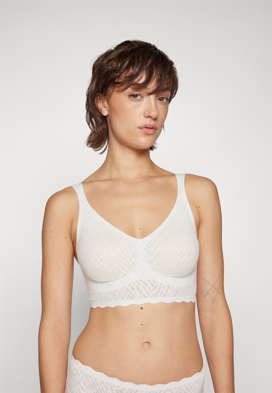 Бюстье Sloggi FEEL BLISS BRALETTE, Silk White/White
Бюстье Sloggi FEEL BLISS BRALETTE, Silk White/White