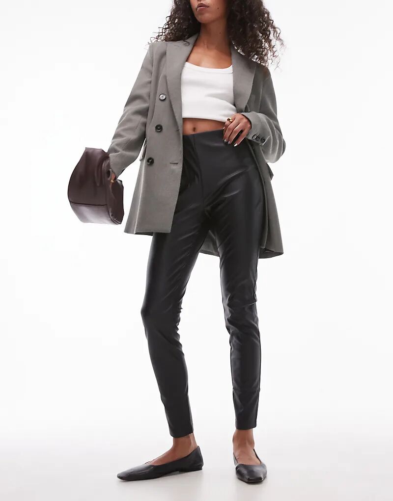 Облегающие леггинсы из искусственной кожи с эластичной талией черного цвета Mango
Облегающие леггинсы из искусственной кожи с эластичной талией черного цвета Mango