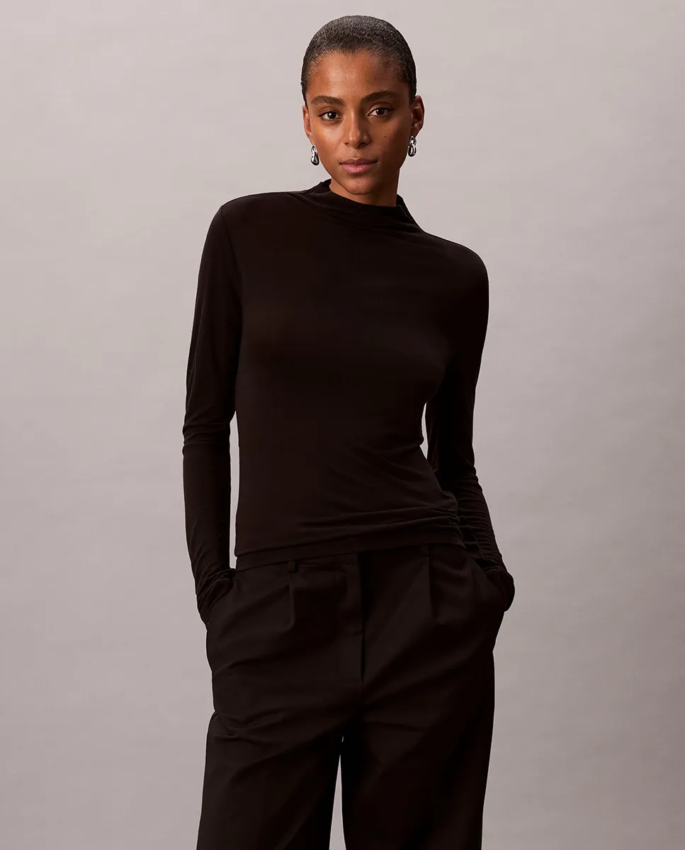 Женский свитер с высоким воротником Calvin Klein, черный
Женский свитер с высоким воротником Calvin Klein, черный