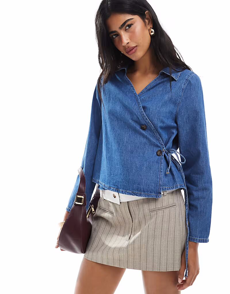 Джинсовая рубашка с завязками-завязками и поясом-утяжкой, средне-синего цвета Asos Design
Джинсовая рубашка с завязками-завязками и поясом-утяжкой, средне-синего цвета Asos Design