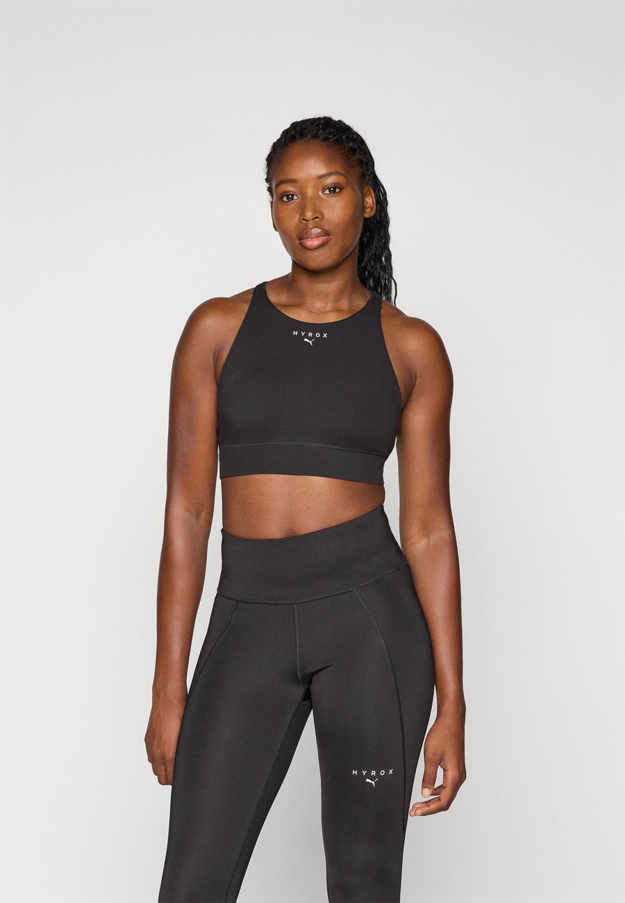 Бюстгальтер Puma HYROX SHAPELUXE HIGH NECK BRA, Black
Бюстгальтер Puma HYROX SHAPELUXE HIGH NECK BRA, Black