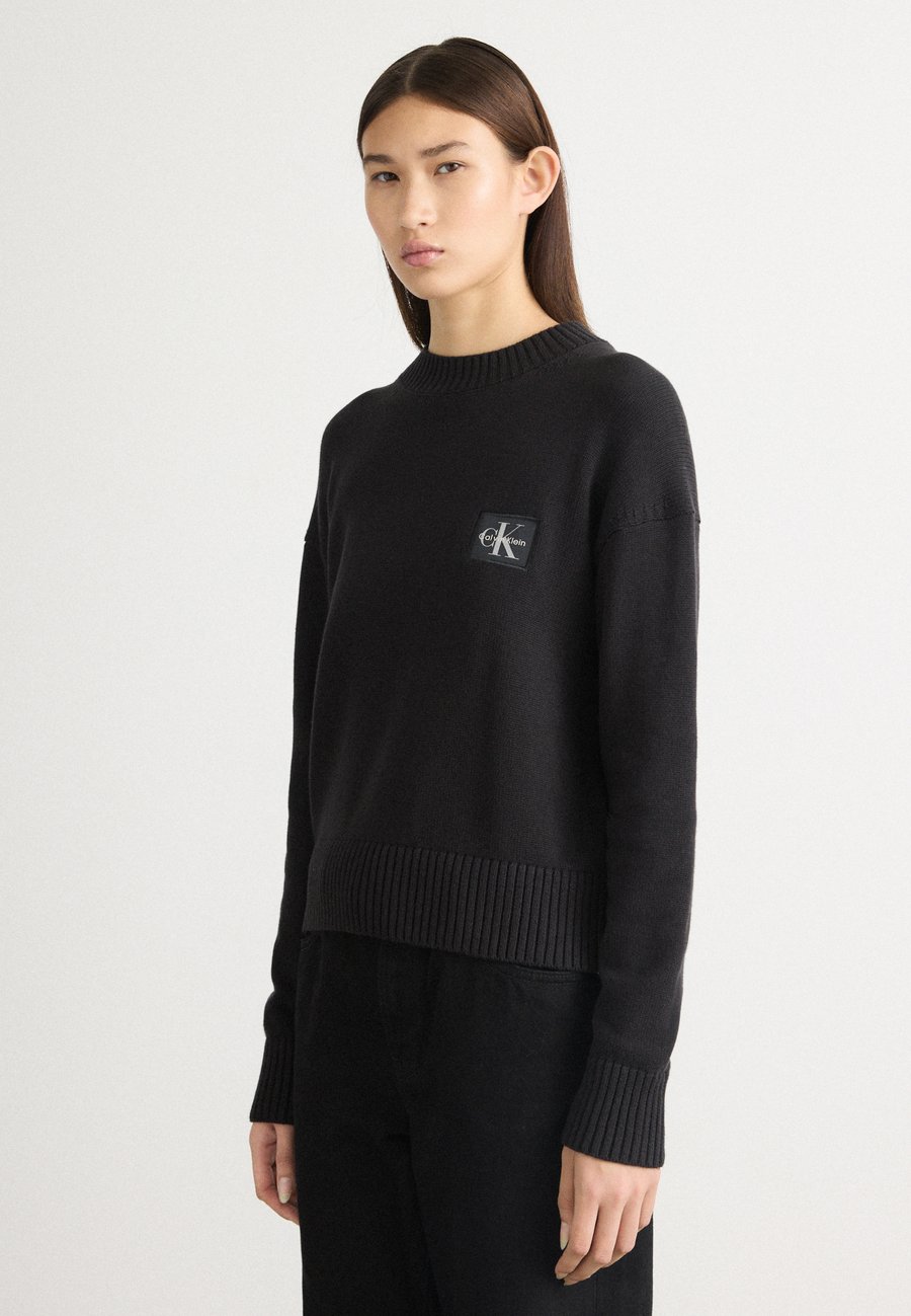 Джемпер Calvin Klein Jeans BADGE SWEATER, Black
Джемпер Calvin Klein Jeans BADGE SWEATER, Black