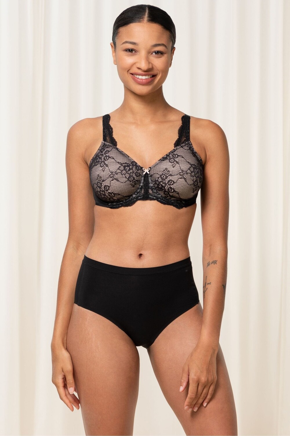 Минимизирующий бюстгальтер со сборками Triumph, черный
Минимизирующий бюстгальтер со сборками Triumph, черный