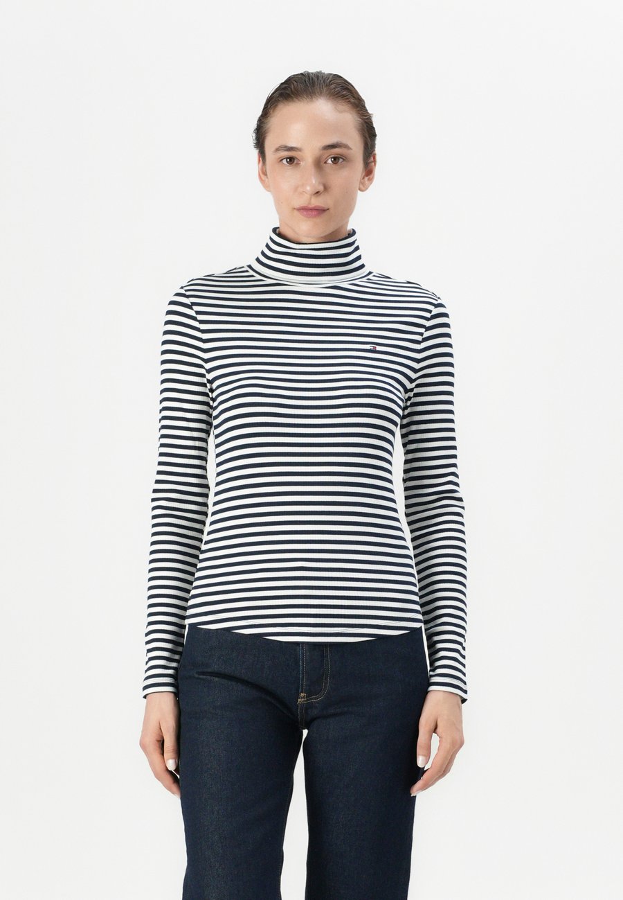 Топ Tommy Hilfiger SLIM ROLL, Dark Night Navy/Ecru/Blue
Топ Tommy Hilfiger SLIM ROLL, Dark Night Navy/Ecru/Blue