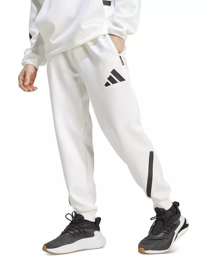 Мужские эластичные спортивные брюки Z.N.E. с кулиской и логотипом adidas, белый 
Мужские эластичные спортивные брюки Z.N.E. с кулиской и логотипом adidas, белый