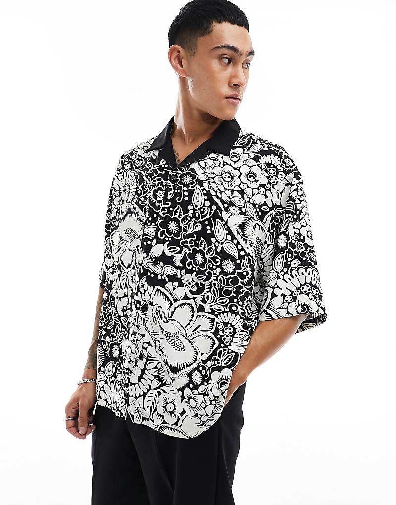 ASOS DESIGN – Свободная рубашка оверсайз черного цвета с белым цветочным узором и воротником с лацканами
ASOS DESIGN – Свободная рубашка оверсайз черного цвета с белым цветочным узором и воротником с лацканами