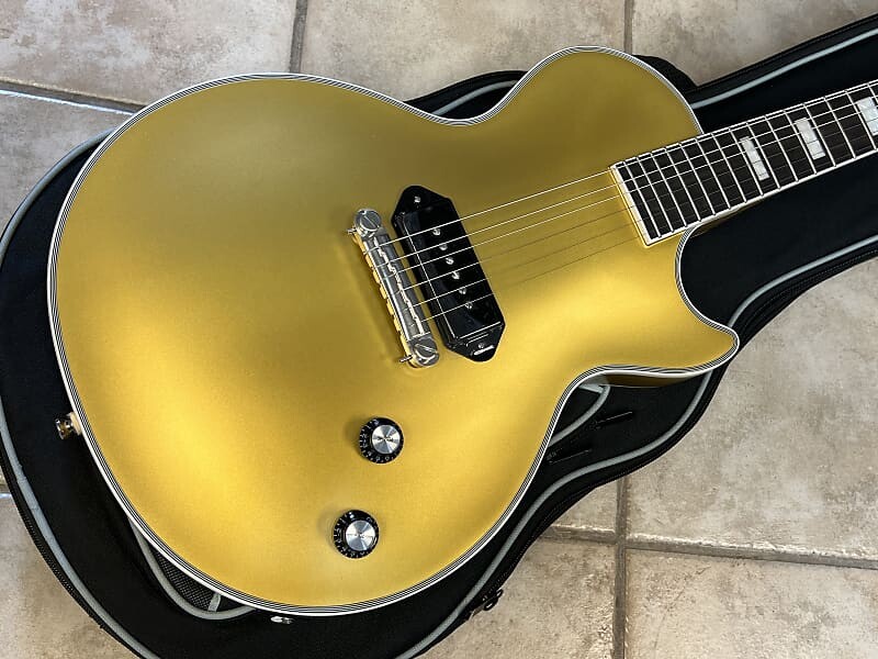 Электрогитара Epiphone Jared James Nichols Gold Glory Les Paul Custom Electric Guitar
Электрогитара Epiphone Jared James Nichols Gold Glory Les Paul Custom Electric Guitar