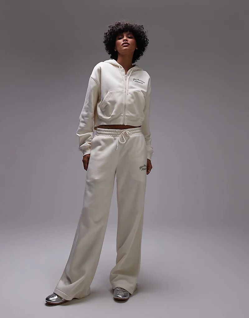 Широкие флисовые брюки New Balance бежевого цвета
Широкие флисовые брюки New Balance бежевого цвета