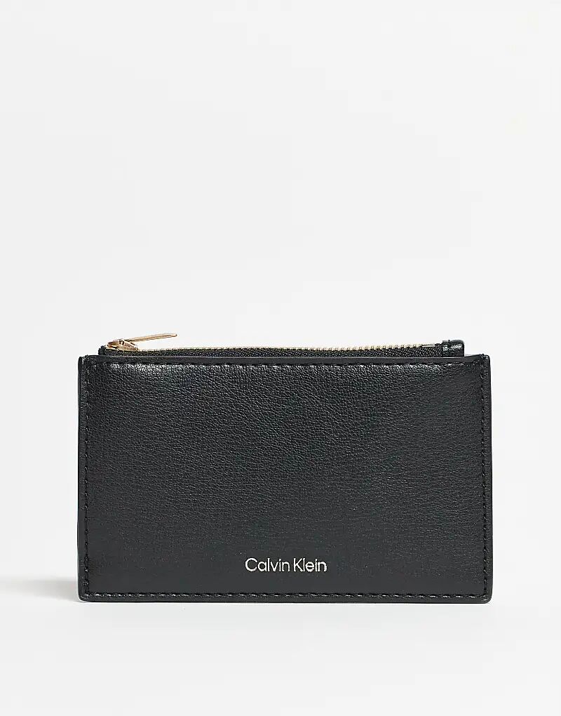 Кошелек с логотипом Calvin Klein на молнии черного цвета
Кошелек с логотипом Calvin Klein на молнии черного цвета