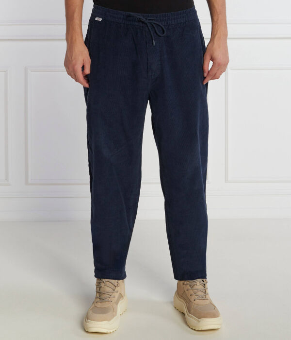 Брюки мужские Tommy Jeans свободные на кулиске, синий
Брюки мужские Tommy Jeans свободные на кулиске, синий
