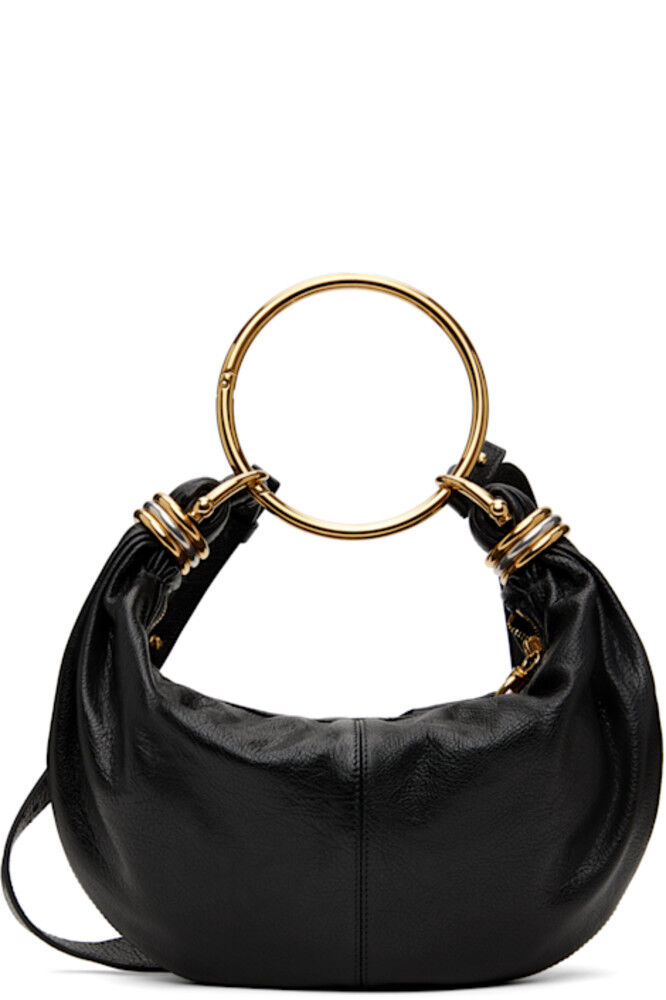 Черная маленькая сумка-браслет Chloé
Черная маленькая сумка-браслет Chloé