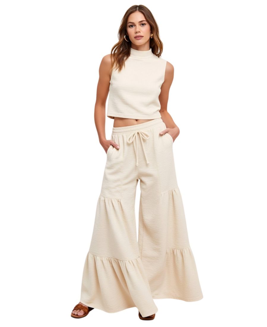 Женский комплект из двух предметов: укороченный топ без рукавов с текстурированным воротником-стойкой и многослойные широкие брюки на шнуровке Modenaire, Cream
Женский комплект из двух предметов: укороченный топ без рукавов с текстурированным воротником-стойкой и многослойные широкие брюки на шнуровке Modenaire, Cream