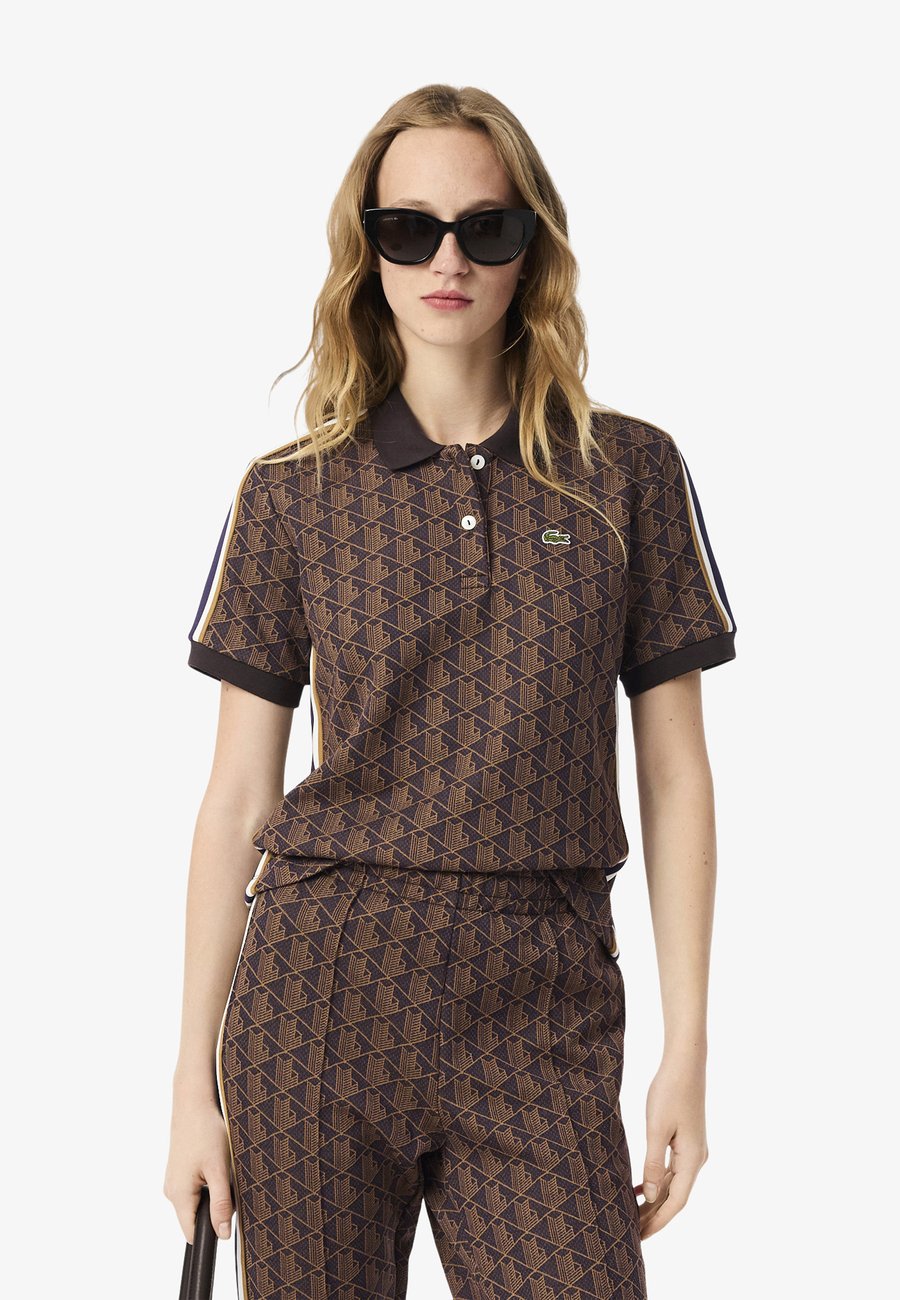 Поло Lacoste Polo shirt, Violet/Marron/Bronze
Поло Lacoste Polo shirt, Violet/Marron/Bronze