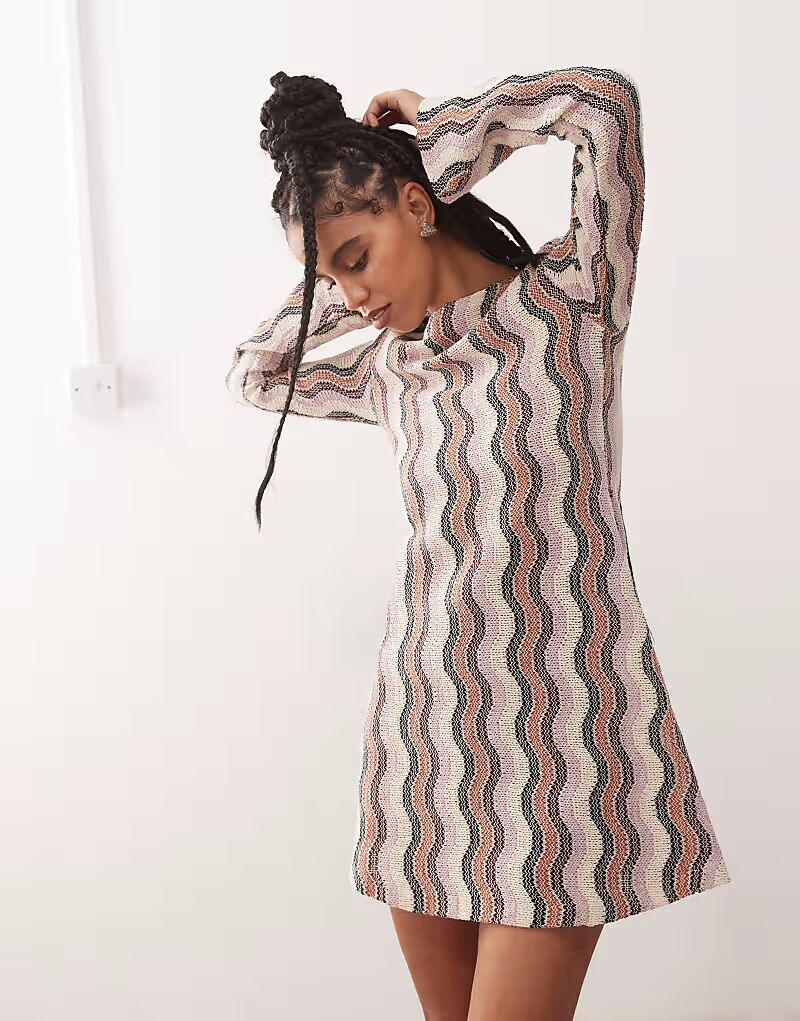 Мини-платье Reclaimed Vintage в полоску с расклешенными рукавами, связанное крючком, в разноцветную полоску
Мини-платье Reclaimed Vintage в полоску с расклешенными рукавами, связанное крючком, в разноцветную полоску