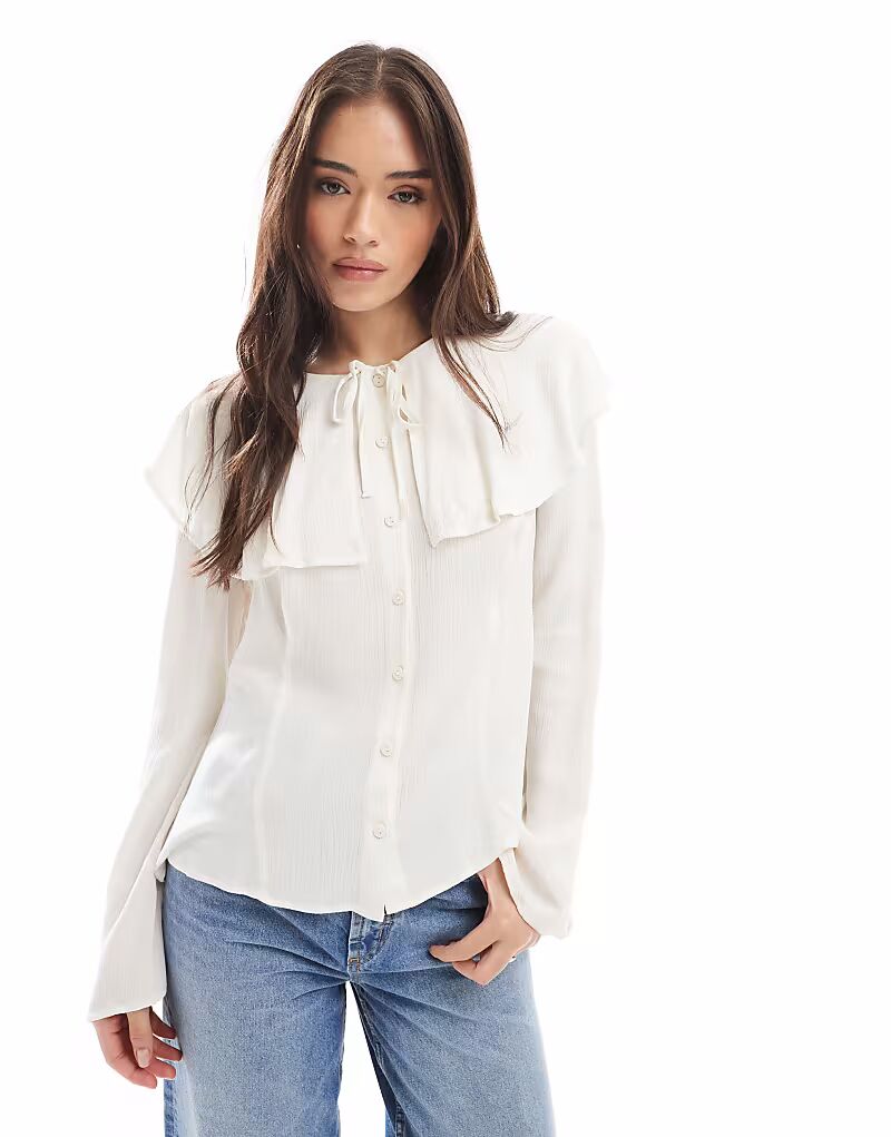 Блузка Miss Selfridge с завязкой спереди и накидкой цвета слоновой кости
Блузка Miss Selfridge с завязкой спереди и накидкой цвета слоновой кости