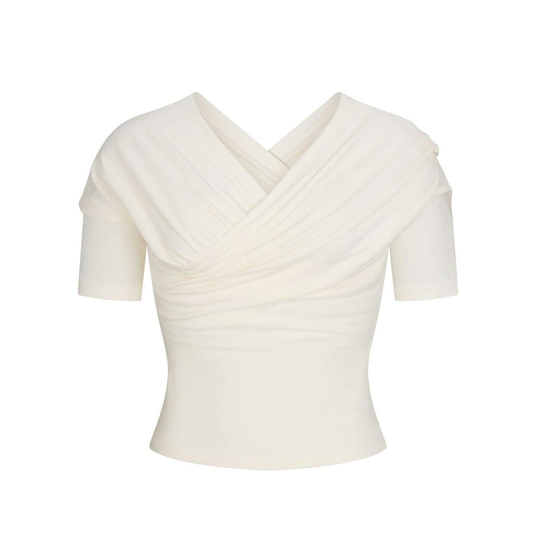 Топ SKIMS Cotton Jersey Wrap, кремовый
Топ SKIMS Cotton Jersey Wrap, кремовый