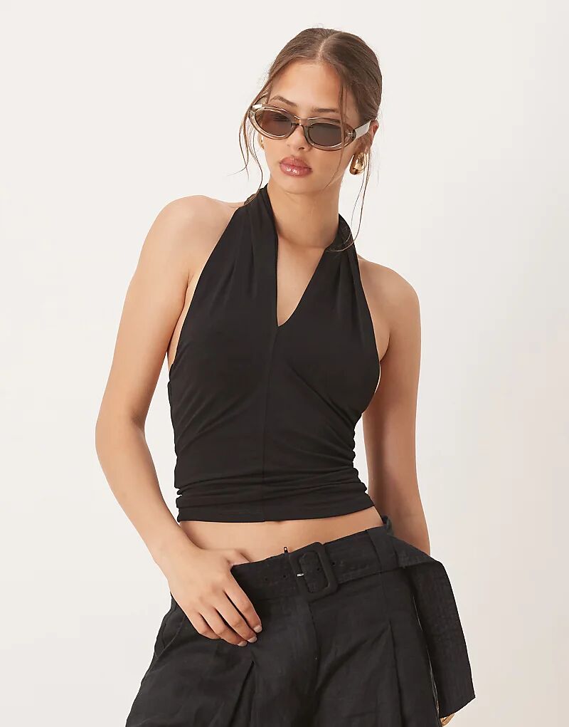 Топ Mango с перекрещивающимися деталями и воротником-халтер черного цвета
Топ Mango с перекрещивающимися деталями и воротником-халтер черного цвета