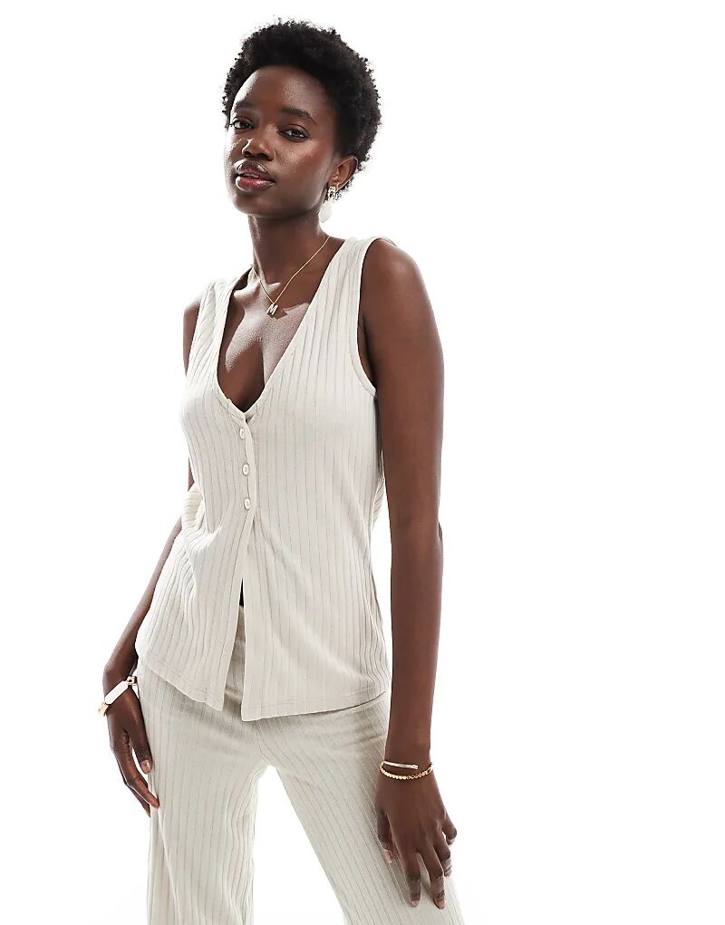 Удлиненный топ без рукавов Vero Moda в рубчик, кремового цвета 
Удлиненный топ без рукавов Vero Moda в рубчик, кремового цвета
