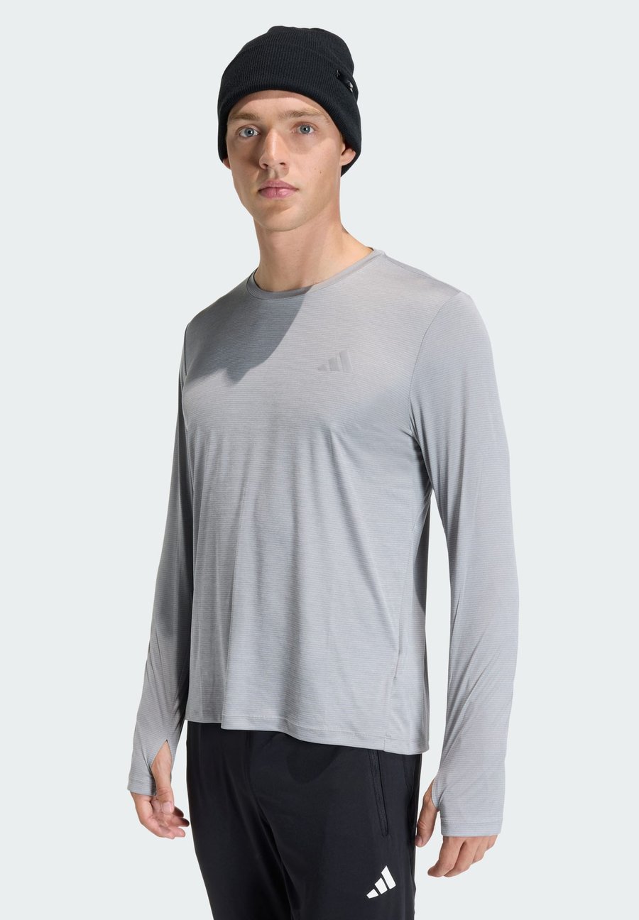 Топ Adidas Performance RUN ESS LS M, Medium Grey Heather/Grey
Топ Adidas Performance RUN ESS LS M, Medium Grey Heather/Grey