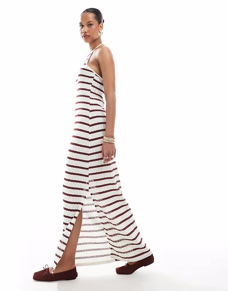 ONLY открытое трикотажное платье макси с халтером и контрастной отделкой в красную и бежевую полоску
ONLY открытое трикотажное платье макси с халтером и контрастной отделкой в красную и бежевую полоску