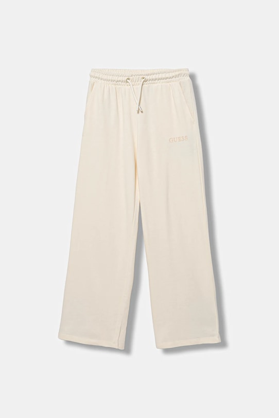 Детские хлопковые спортивные брюки Guess, бежевый
Детские хлопковые спортивные брюки Guess, бежевый