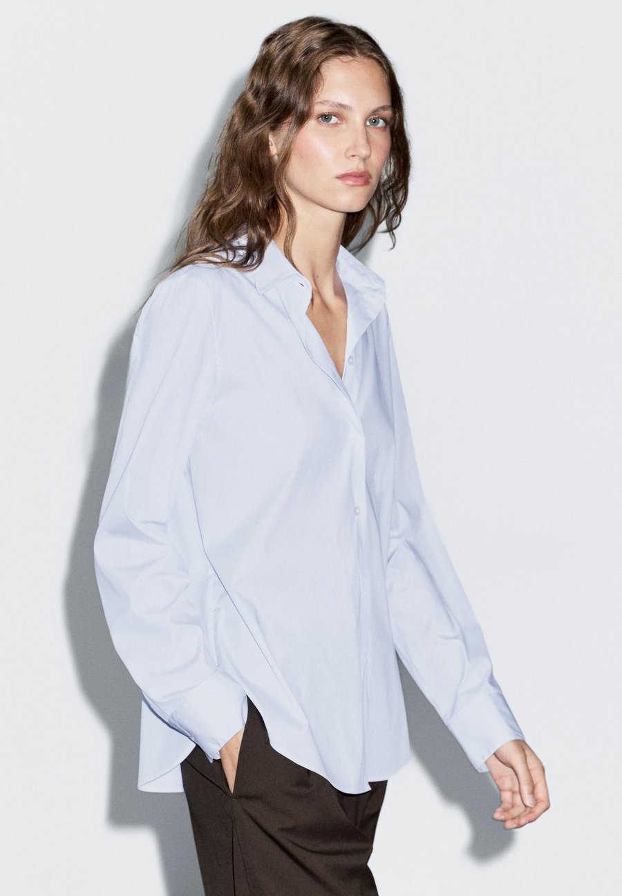 Блуза Massimo Dutti STRIPED STRETCH GARMENT, Blue
Блуза Massimo Dutti STRIPED STRETCH GARMENT, Blue