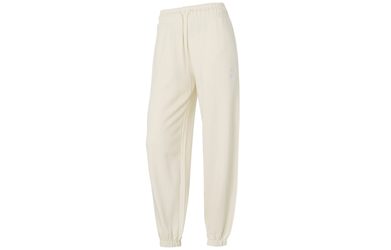 Трикотажные спортивные штаны женские цвета слоновой кости Puma
Трикотажные спортивные штаны женские цвета слоновой кости Puma