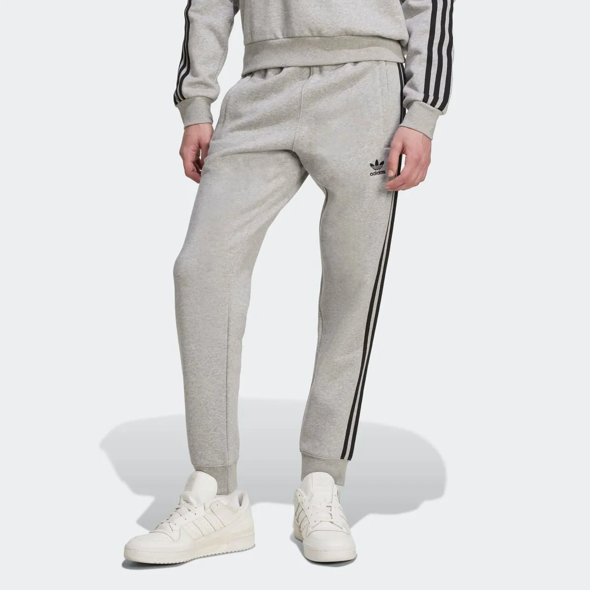 Мужские брюки Adicolor 3 полоски Originals adidas, серый
Мужские брюки Adicolor 3 полоски Originals adidas, серый