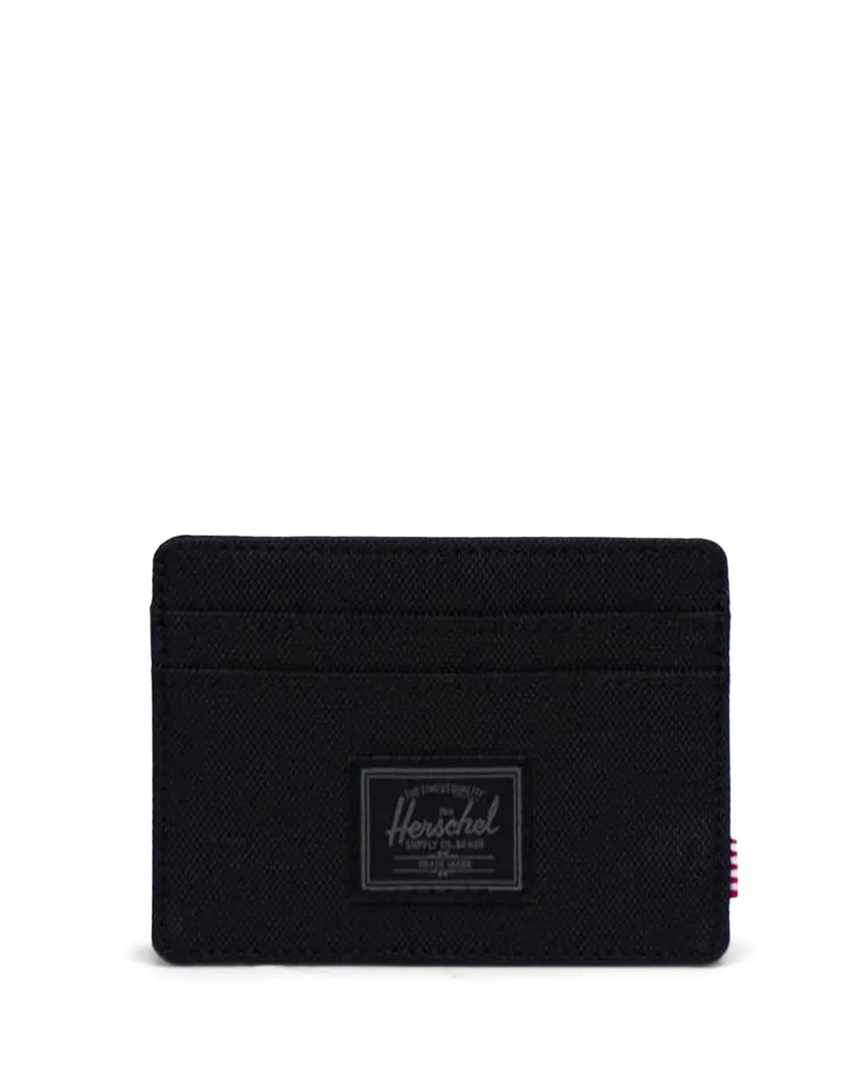 Черный тканевый кардхолдер для мужчин из переработанного материала Herschel
Черный тканевый кардхолдер для мужчин из переработанного материала Herschel