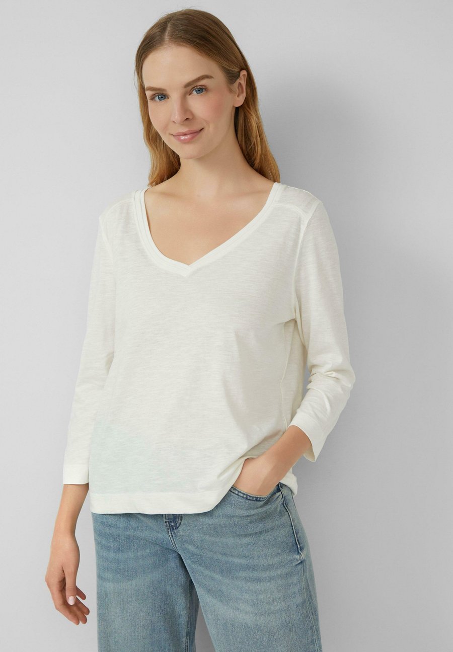 Топ s.Oliver 3/4-ARM MIT TIEFEM V-AUSSCHNITT, Creme/Off-White
Топ s.Oliver 3/4-ARM MIT TIEFEM V-AUSSCHNITT, Creme/Off-White