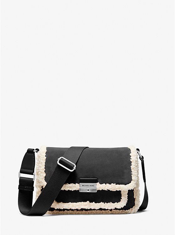 Средняя замшевая сумка-почтальон Bradshaw с искусственной овчиной Michael Kors, черный
Средняя замшевая сумка-почтальон Bradshaw с искусственной овчиной Michael Kors, черный