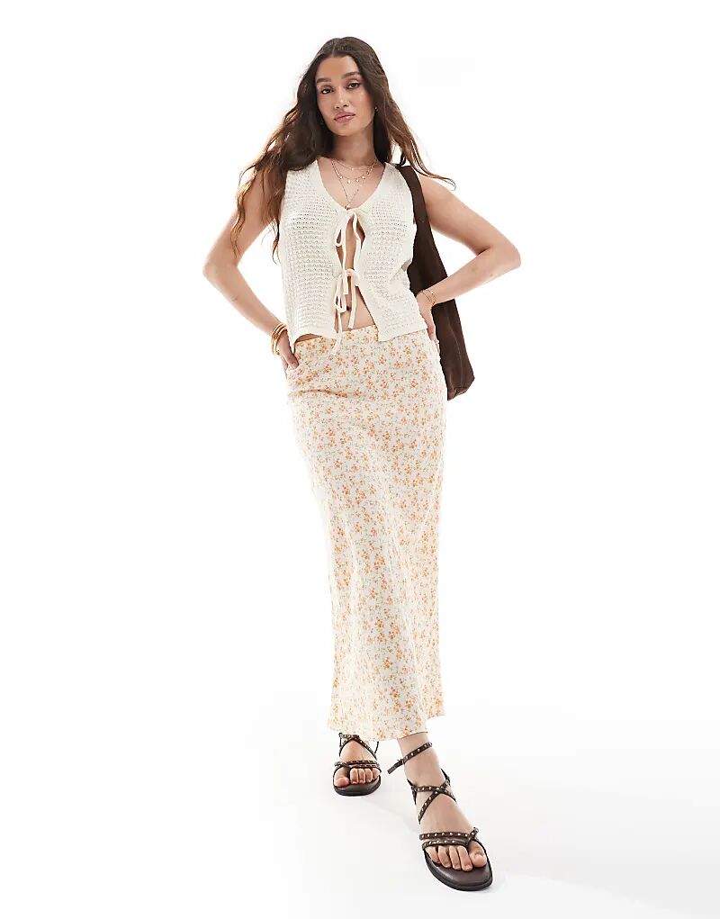 Юбка миди New Look с косой талией и желтым цветочным принтом
Юбка миди New Look с косой талией и желтым цветочным принтом