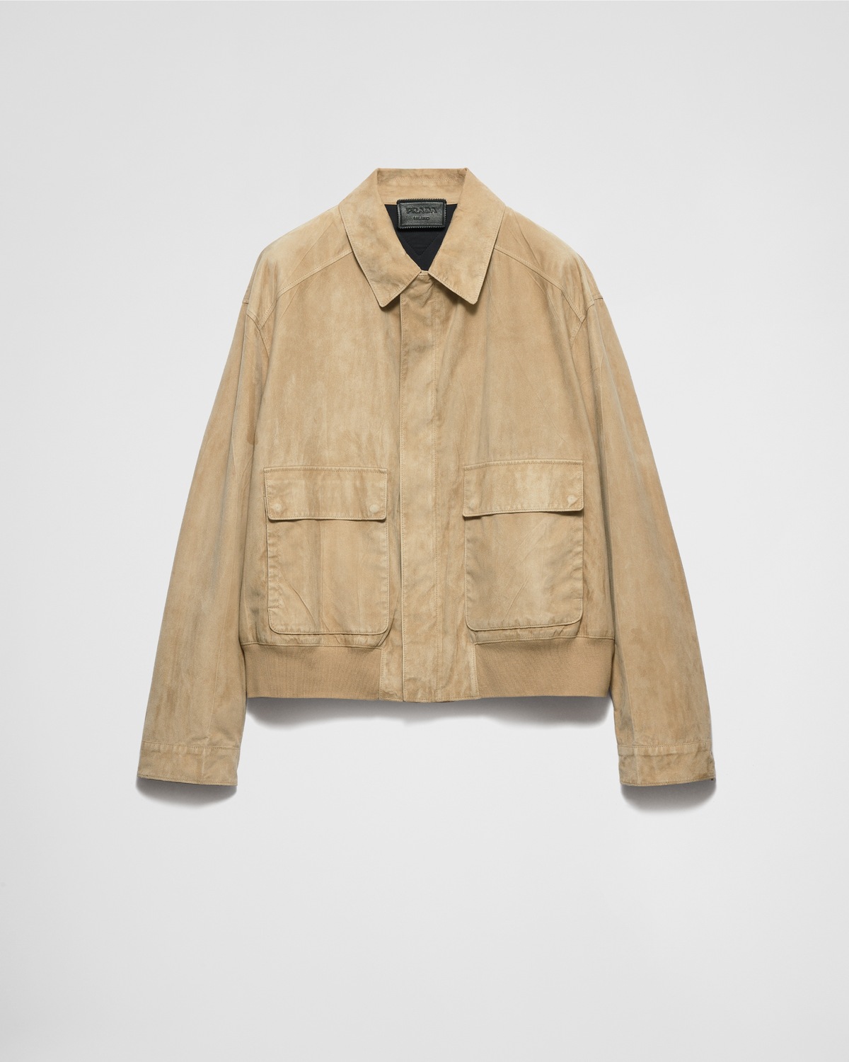 Бомбер из замши и хлопка Prada, бежевый
Бомбер из замши и хлопка Prada, бежевый